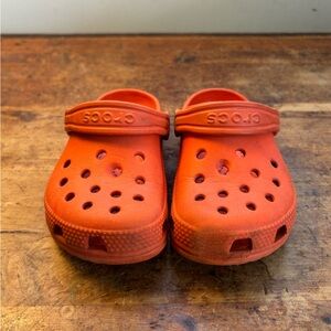 Crocs Kids' Classic Clog in bright orange, toddler size 9